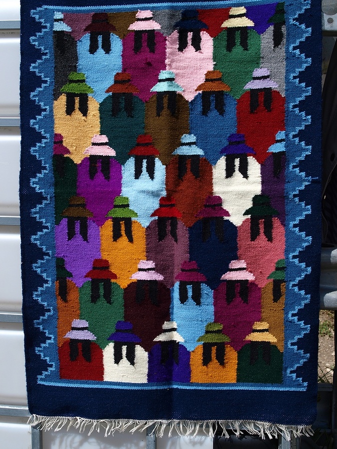 Hand-woven cotton carpet / mat
