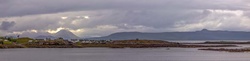 Ard Dhubh, fishing boat sets out, Skye and Raasay in background.jpg